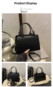 Detail of matte black leather handbag showing knotted handle craftsmanship and gold text