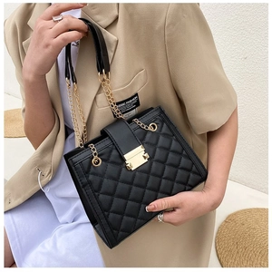 Chic black quilted crossbody bag with gold hardware and elegant chain strap details
