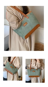 Detailed view of sage green and brown large tote bag with suede texture and contrast straps