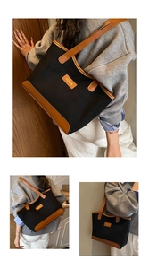 Detail of fashion canvas tote bag featuring brown leather patchwork and fashion label