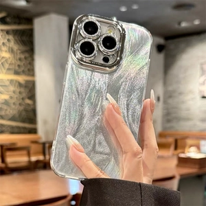 Silver glitter iPhone case featuring flowing sand texture and metal camera protection
