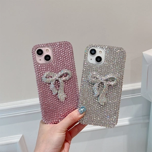 Luxury full diamond bow phone case for iPhone 16 Pro Max in pink and silver