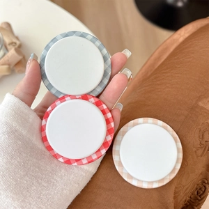 Magnetic checkered phone socket grip set with classic blue, red, and beige patterns