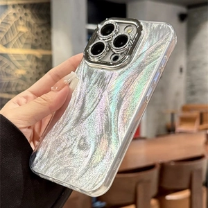 Macro detail of iPhone 15 Pro case with iridescent wood grain texture and metal lens ring
