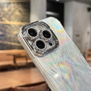 Macro view of holographic glitter phone case with rhinestone-encrusted camera lens frames