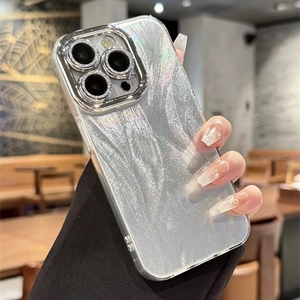 Close-up of luxury silver glitter phone case for iPhone with protective metal camera ring