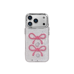 Glitzernde iPhone Hülle mit rosa 3D-Schleifen, weißen Perlen und Sternen-Details