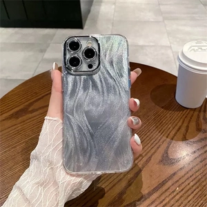 Silver luxury glitter marble pattern phone case for iPhone 17 Pro Max in coffee shop setting