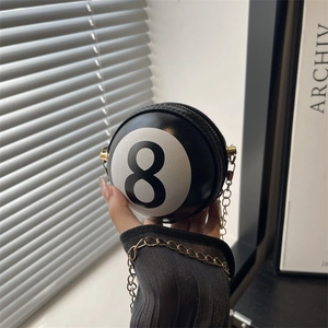 Creative 8-ball billiard shaped crossbody bag with black faux leather and gold chain strap