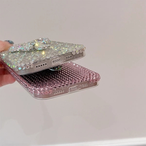 Close-up of luxury full diamond bow phone case with precise cutouts for iPhone models