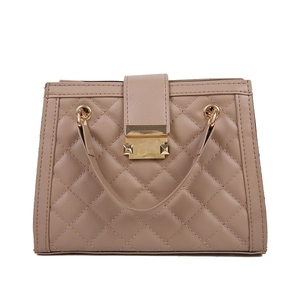 Quilted crossbody bag for women with gold clasp in apricot synthetic leather