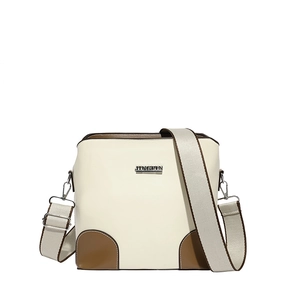 Beige and brown leather crossbody bucket bag with wide strap and silver metal logo