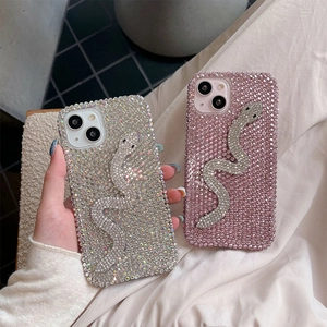 Luxury rhinestone snake case for iPhone 16 Plus and 17 Pro Max in silver and pink colors