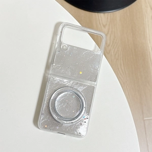 Detail of glitter starry Samsung Z Flip case with magnetic ring holder on white surface