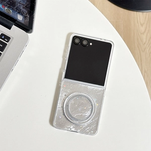 Detail of Galaxy Z Flip case with silver glitter stars and MagSafe magnetic ring stand