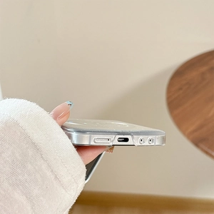 Detailed close-up of precise charging port and speaker cutouts on the glitter phone case