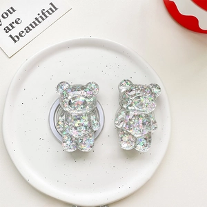 Detail of 3D glitter bear phone grip with iridescent sequins and retractable base