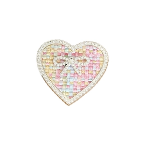 Sparkling tweed heart phone grip with rhinestone bow and colorful woven pattern