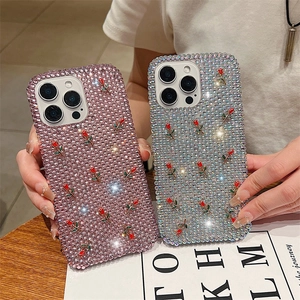 Luxury rhinestone iPhone case with 3D red rose decor in pink and iridescent finishes