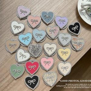 Luxury rhinestone bow heart phone socket grips in leather and tweed textures