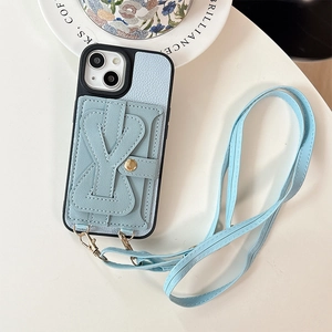 Detail of light blue lychee leather phone case with card holder and adjustable crossbody strap