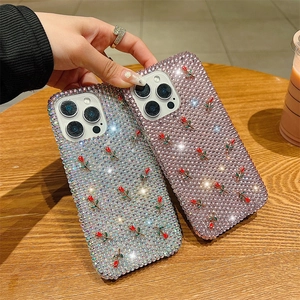 Luxury rhinestone phone case with mini roses for iPhone, featuring silver and pink crystals