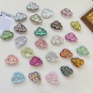 Cloud-shaped sparkling glitter phone socket stand with various pastel and metallic colors