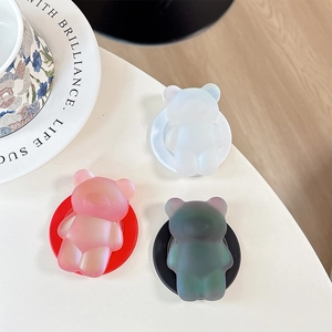 Supporto magnetico Magsafe orsetto laser iridescente in tre diversi colori sfumati