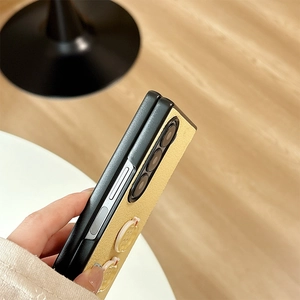 Close-up of beige leather case for Samsung Z Flip series with precise side cutouts