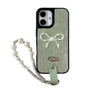 Mint green faux leather iPhone case with white bow and pearl beaded wristlet strap