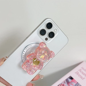 Détail du support de téléphone ours rose à paillettes avec cœur et texte cadeau