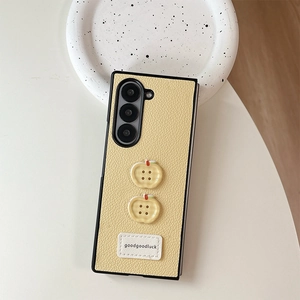 Detail of lychee textured leather folding case with apple buttons for Samsung Z Fold