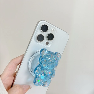 Sparkly blue glitter bear phone socket holder with holographic sequins on white phone