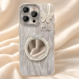Close-up of iPhone case featuring a glittery silver finish and butterfly pearl mirror detail