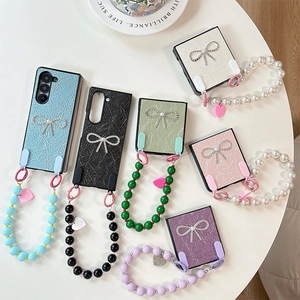 Custodie ZFlip in pelle con fiocchi di strass e catenelle di perline colorate