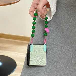 Custodia verde con fiocco di strass e catena di perle per Samsung Galaxy Z Flip 6
