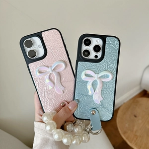 Pink and blue leather iPhone case with 3D pearl bow and elegant pearl wrist strap