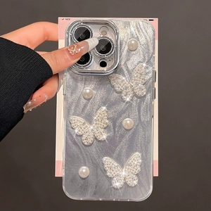 Detail of iPhone case with silver butterflies and pearls on gray-purple marble texture