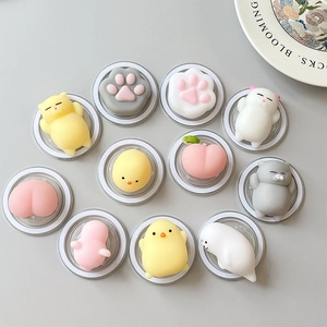 Set of 11 cute mochi squishy toys including cat paws and chicks in pastel colors