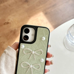 Light green leather texture iPhone case with silver diamond bows and elegant pearls