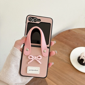 Pink leather phone case with wrist strap and 3D bow for Samsung Galaxy Z Flip 6