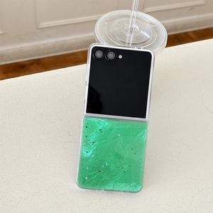 Detail of green wavy glitter case for Samsung Z Flip with sparkling star sequins