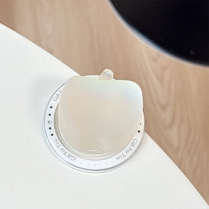 Detail of 3D apple shaped matte translucent phone griptok with Gift For You base