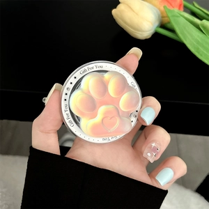 Detail of 3D cat paw phone grip with colorful laser gradient and heart-shaped pad detail