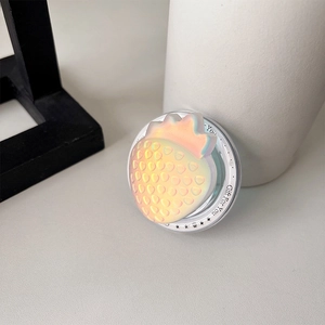 Macro view of 3D iridescent laser strawberry phone socket with realistic fruit textures