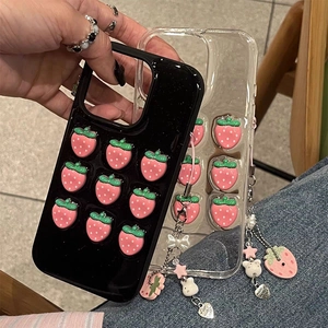 3D strawberry phone cases for iPhone 16 Pro Max with decorative charms and lanyards