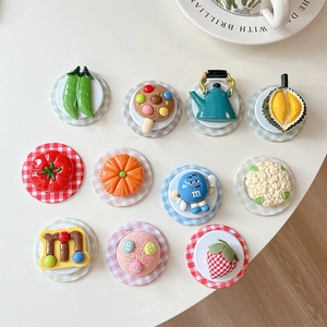 Creative food-shaped phone grip sockets and magnetic mounts featuring 3D resin fruit designs