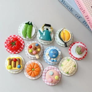 Variety of cute resin miniature food and fruit phone grip stands on plaid bases