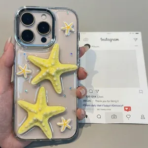 Detail of iPhone case with 3D yellow starfish ornaments and sparkling silver glitter