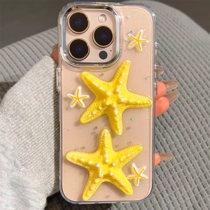 Detail of transparent iPhone case with 3D yellow starfish and silver glitter sequins